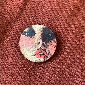 Unique woman’s face brooch